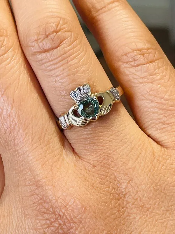 On Hand 14k Gold Heartshape Teal Sapphire And Diamond Claddagh Ring