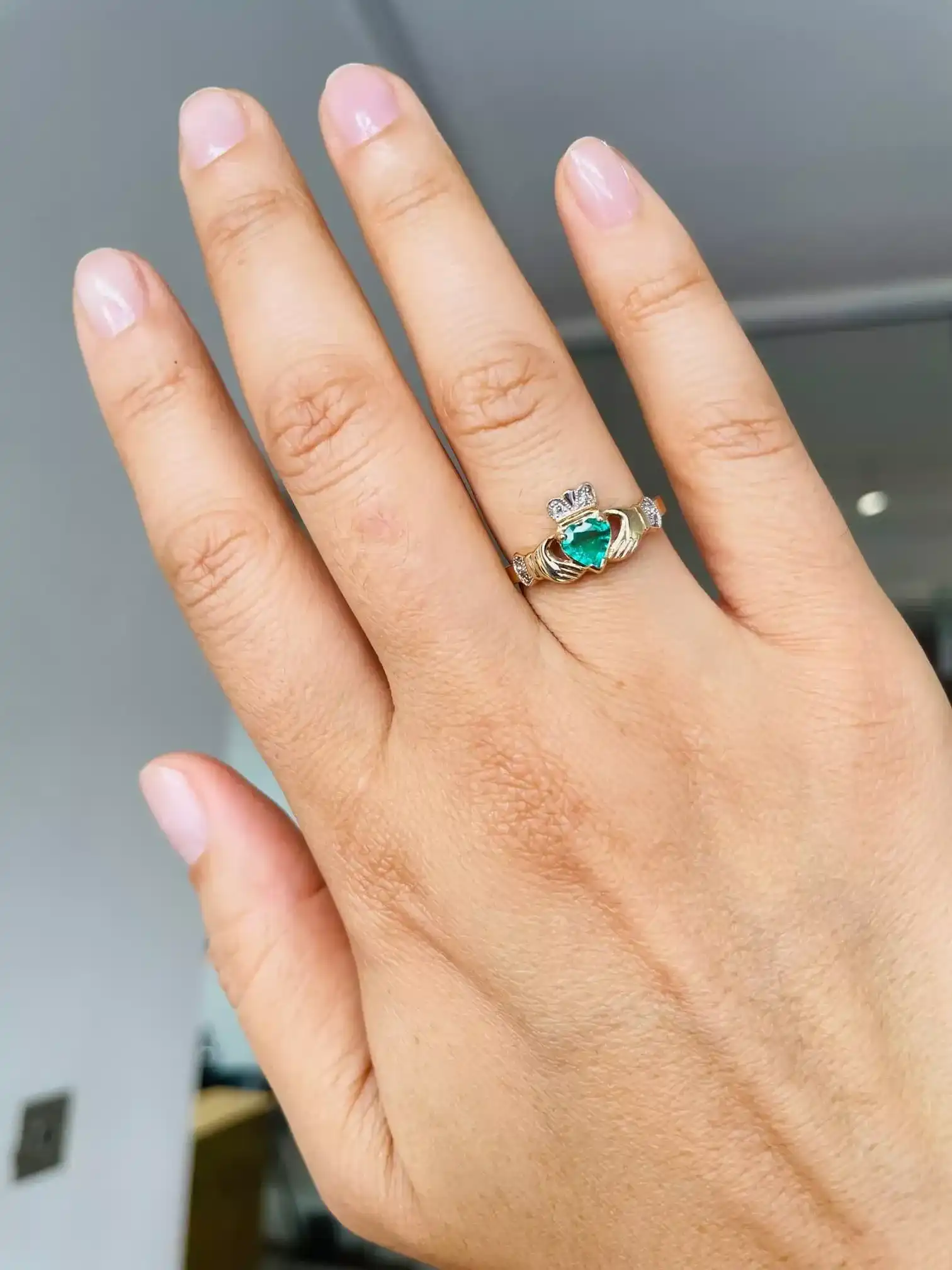 What Does an Emerald Engagement Ring Symbolize?