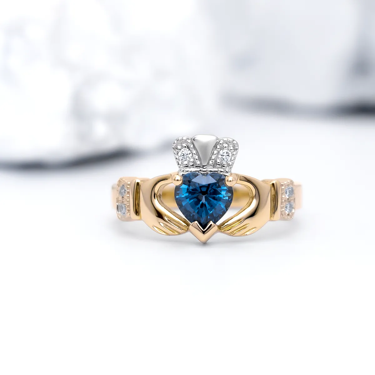Gold And Sapphire Claddagh Ring With Brilliant Cut Diamond
