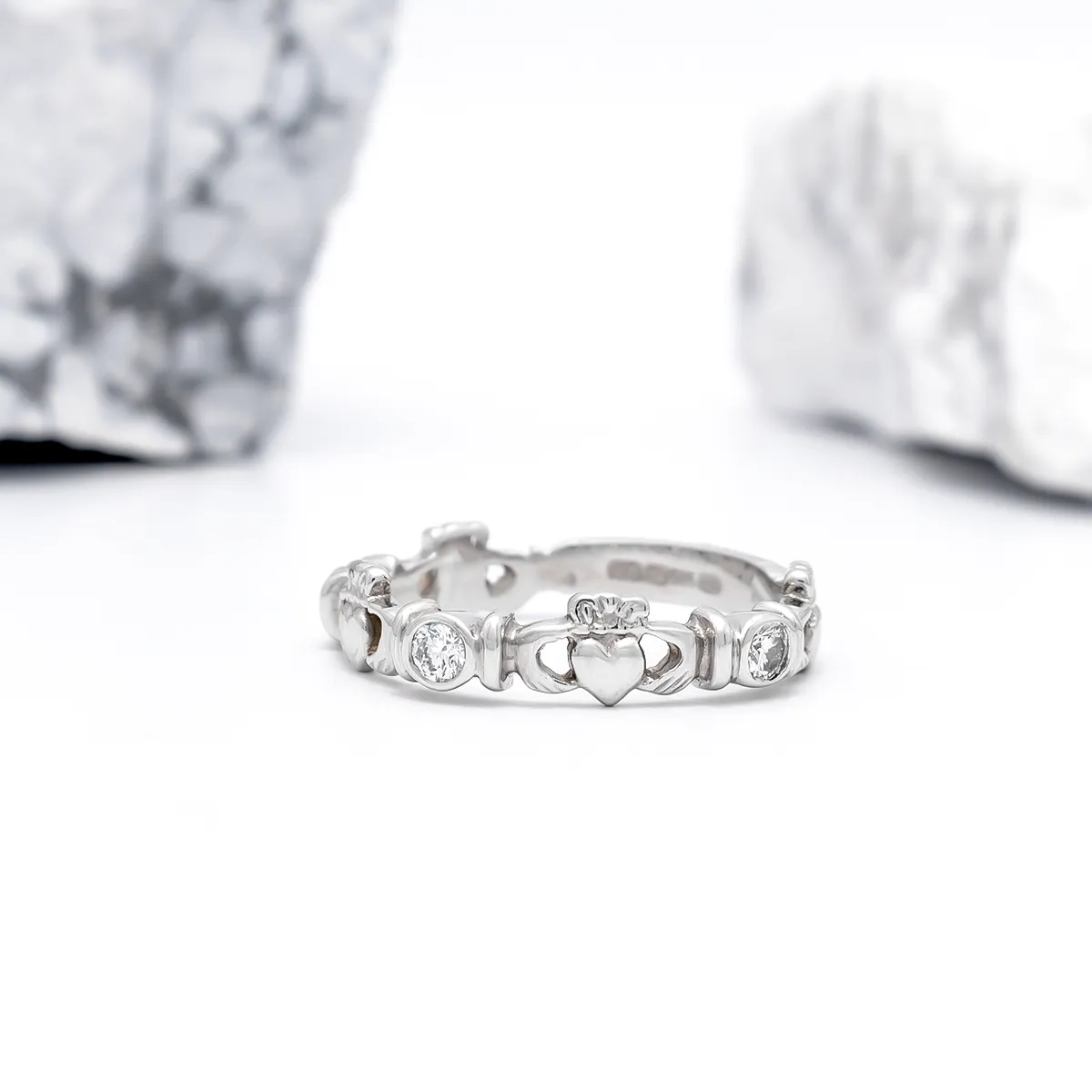 White Gold Claddagh Ring Adorned with Diamonds...