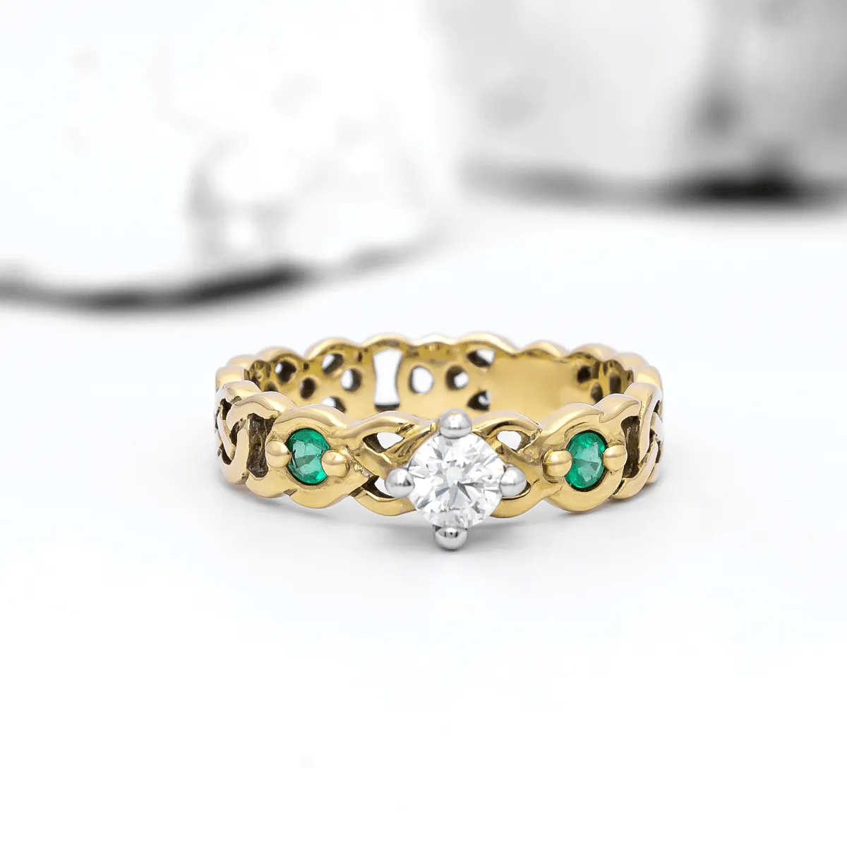 Gold Celtic Knot Ring With Diamond And Emeralds