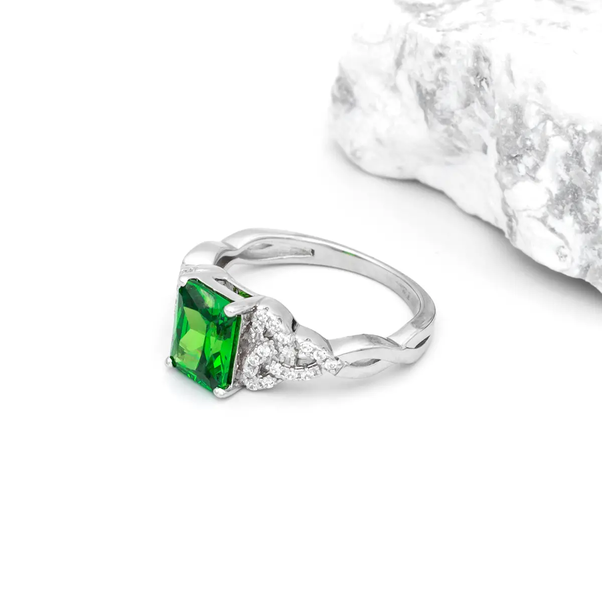 Sterling Silver Trinity Knot Ring Featuring Green Crystal...