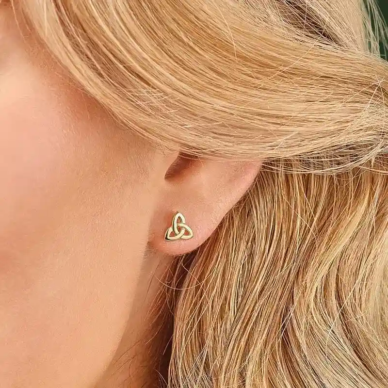 9k Gold Trinity Knot Earrings On Model...