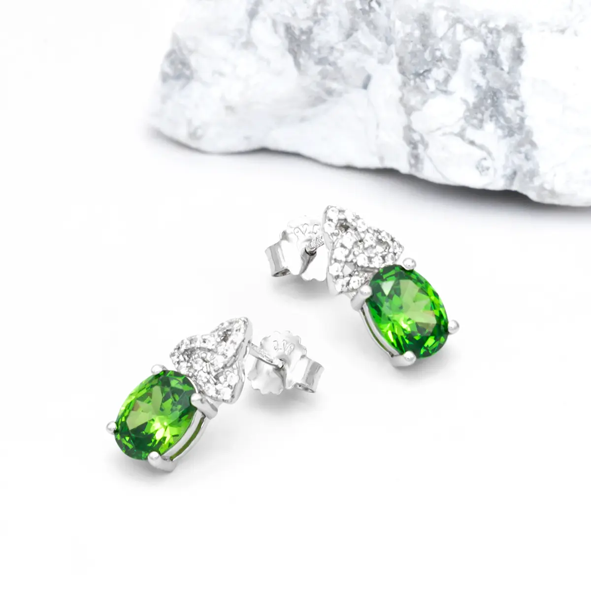Silver Trinity Knot Stud Earrings With Green Cubic Zirconia...