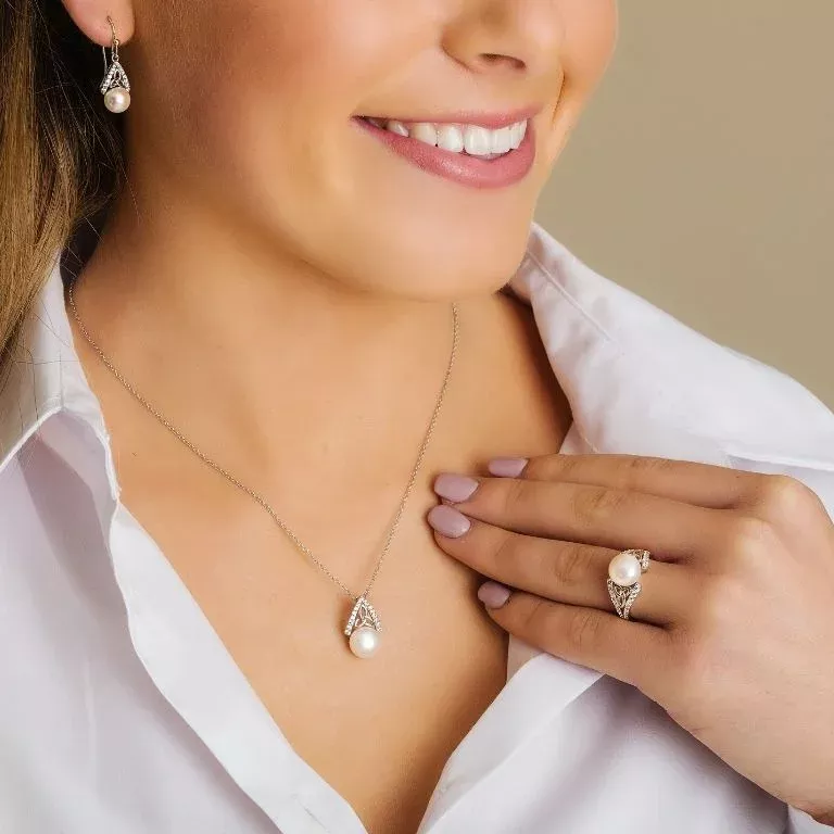 2 Intricate Trinity Knot Pearl Pendant On Model